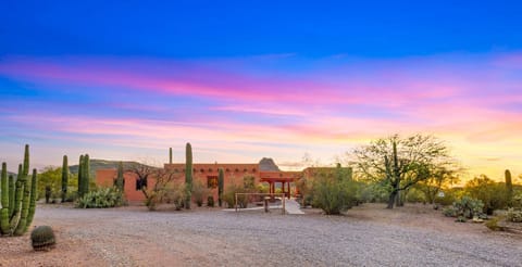 Tucked away on 5 acres, with views of the Tucson Mountains, just minutes from Saguaro National Park, with nearby hiking/ riding trails.