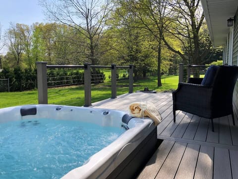 Welcome to your Home Away From Home! Beautiful backyard and hot tub! Can't you see yourself relaxing the evening away?