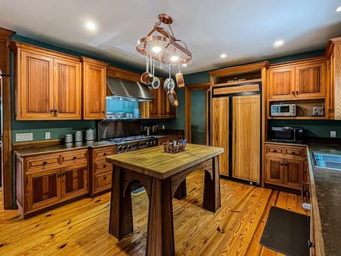 Kitchen with a custom island built by a local wood craftsman!