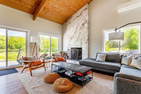 Airy, bright living room with views of the lake