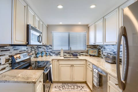 Updated Kitchen with Granite Countertops and Stainless Steel Appliances