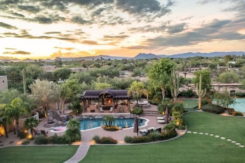 Your private desert resort awaits. 6000+ sq ft estate with pool, spa, sports court, and putting green.