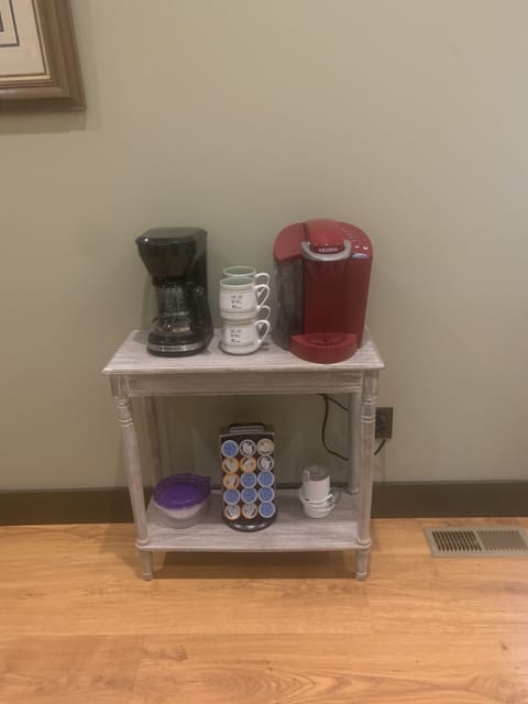 Keurig, coffe pot, filters, sweetener, pods and coffee grinder.