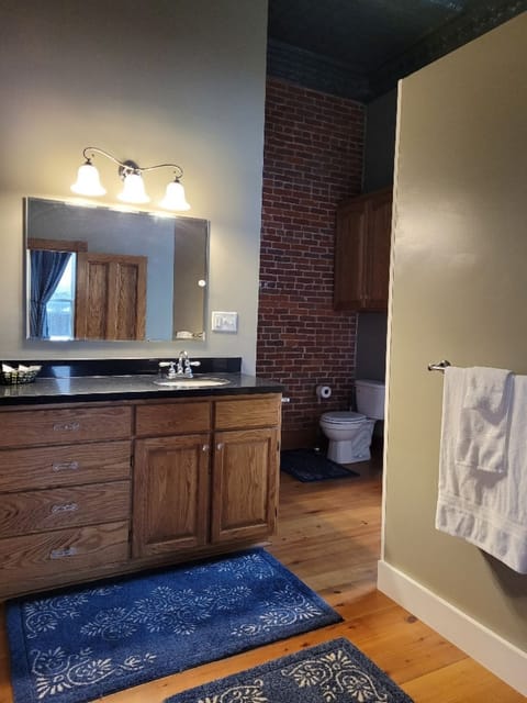 Main Bath with entrance from Bedroom 1 and hallway