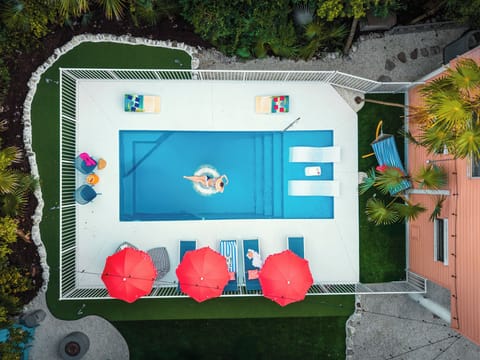 NEWLY RENOVATED BACKYARD!! Grab a cold drink, stretch out on the tanning loungers, and enjoy every sunny moment.