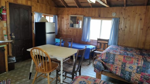 Cabin 7 features two full size beds and a twin cot. (1)