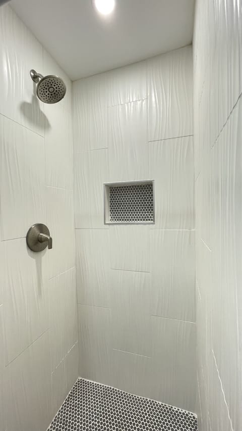 Tiled shower.