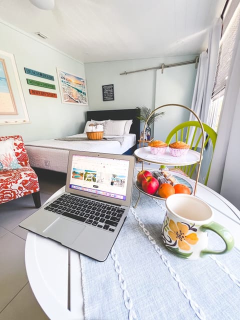 A dedicated work space with high-speed internet overlooking the tropical garden.