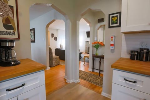 Beautiful arched doorways offer beautiful sight lines from the Living, Dining and Kitchen!