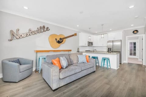 Gathering area open to the kitchen. Sofa pulls out for more sleeping options