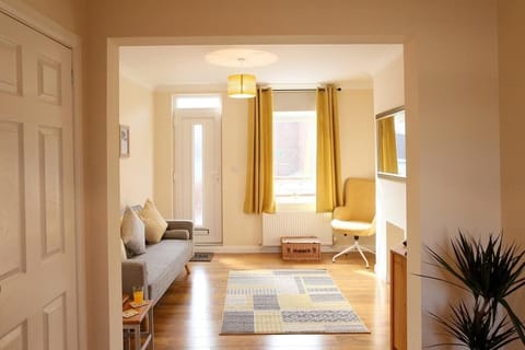 A cozy lounge space designed for your utmost comfort, where you can unwind while enjoying your favorite movies or TV shows on a spacious Netflix-enabled television.
