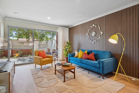 Lounge opens to a private courtyard with seamless flow through kitchen and dining