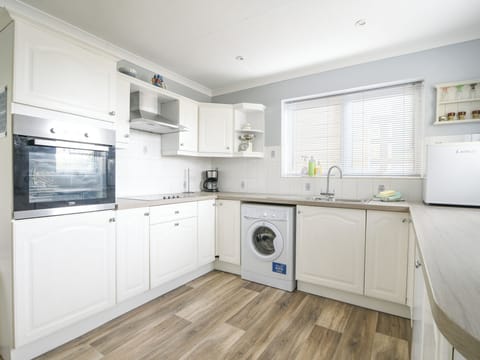 Fridge, microwave, cookware/dishes/utensils