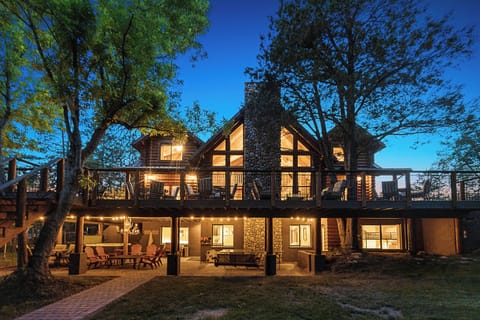 Twilight View of Luxury Log Cabin Retreat