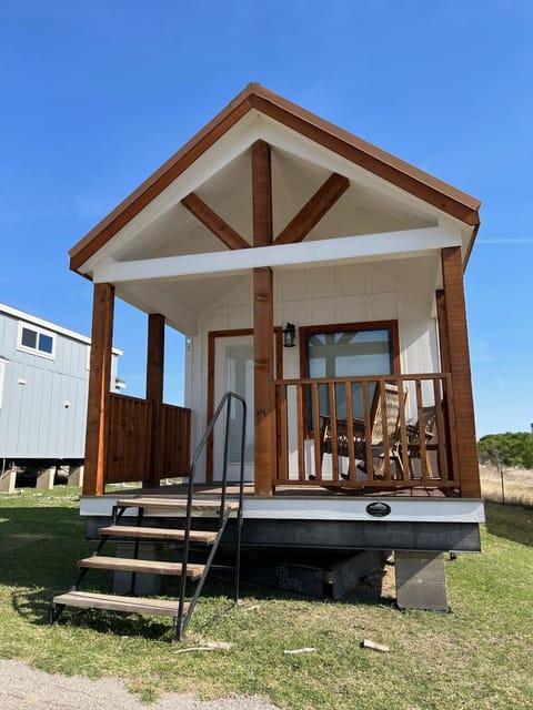 Exterior of white Tiny House called `Austin Music`