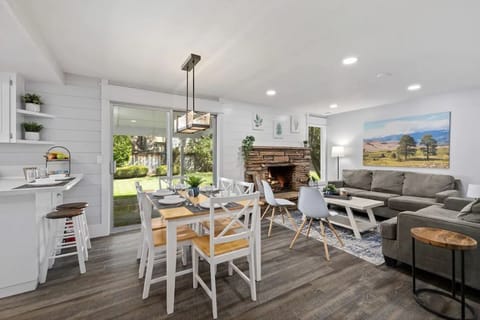 Dining area and Gathering Room off Kitchen. Shows back sliding door.