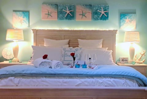 Your inviting, king pillowtop mattress and soft linens,,, where stress slips off & relaxed slips 