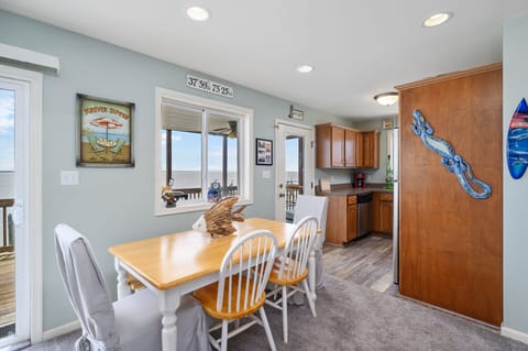 Calming Coastal Colors throughout this bayfront beauty.