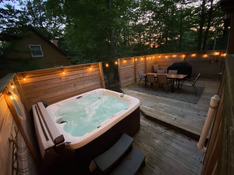 Enjoy a private outdoor space complete with outdoor seating, hot tub, bbq grill, and eating area that seats 8 comfortably.