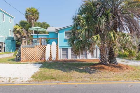 Enjoy the lazy days of summer in this upstairs apartment with full deck. 