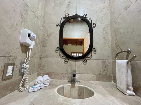 Family Cabin | Bathroom | Shower, rainfall showerhead, hair dryer, towels