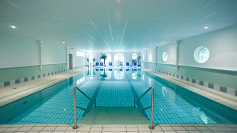 Indoor pool, open 8:00 AM to 9:00 PM, sun loungers
