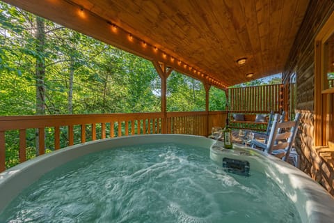 Relax among the treetops in your own private hot tub.