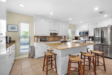 Kitchen with eat-in bar seating