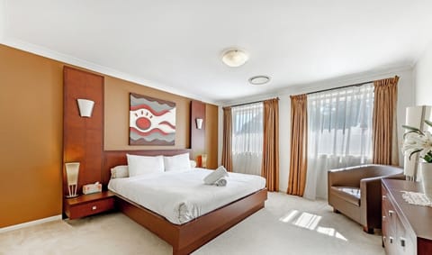 Clean and comfortable bedroom with attached bathroom