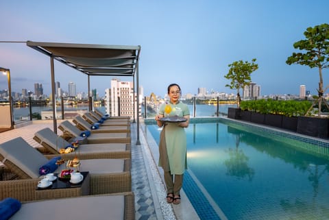 Outdoor pool, pool umbrellas, sun loungers