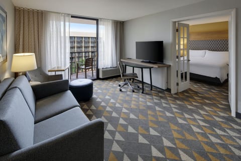 Suite, 1 King Bed with Sofa bed | Pillowtop beds, in-room safe, desk, blackout drapes