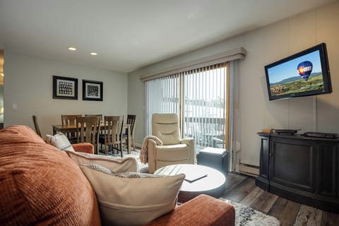 Unwind in your spacious living area with plush seating, entertainment center, and dining space for memorable evenings together.