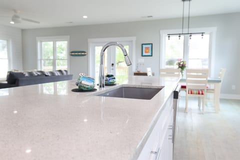 Kitchen Island with sink, plenty of counter space for cooking