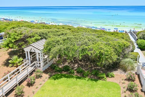 Exspansive Gulf Views Over Beatiful Naitve Tree Arbor and Garden.