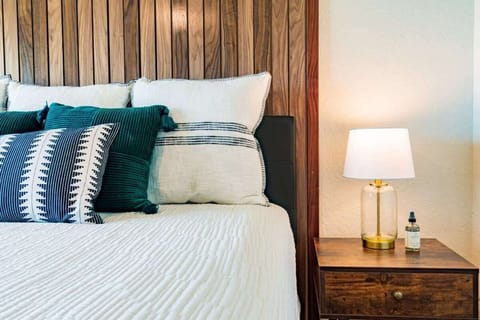 This unique and comfortable primary bedroom makes relaxing easy!