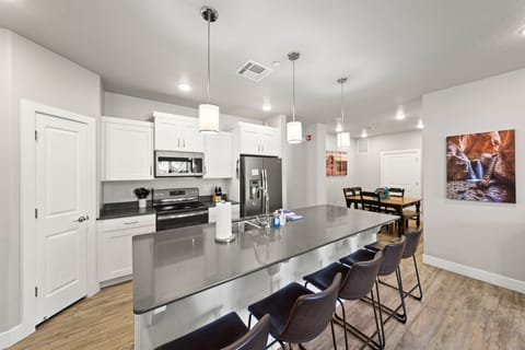 Isn't this an awesome kitchen? Pantry on your left and bar on your right