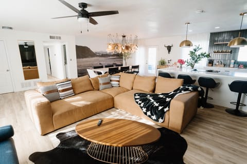 Kick back and relax in this cozy, sunlit living room — your home away from home.