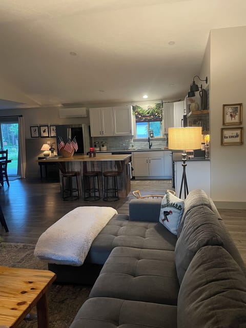 Family room with attached kitchen.