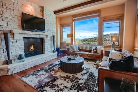 Luxury Condo | Living area | 40-inch flat-screen TV with digital channels, TV, fireplace