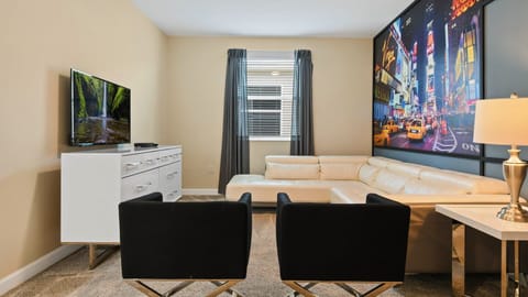 Family fun central! This room's got comfy couches, a big screen & board games galore for epic movie nights