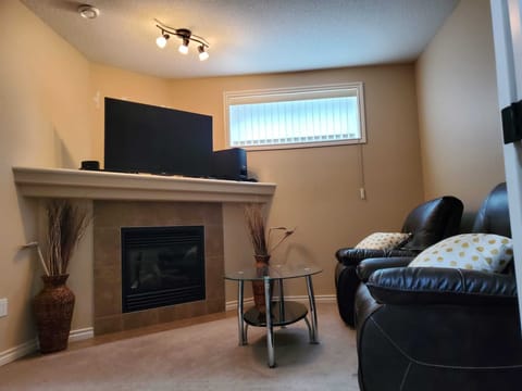 Beautifully furnished living room with fireplace.