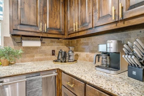 Fully stocked coffee and tea bar with multiple brew options.