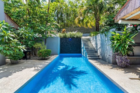 Catch a sunny day poolside to the soothing sounds of our waterfall