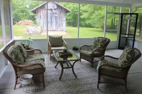 Relax in the beautiful screened in patio. 