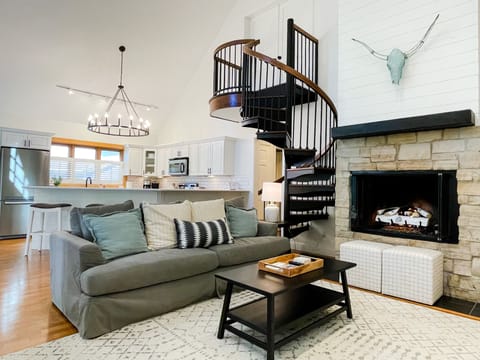 Our open floorplan living room, dining area and kitchen-perfect for entertaining