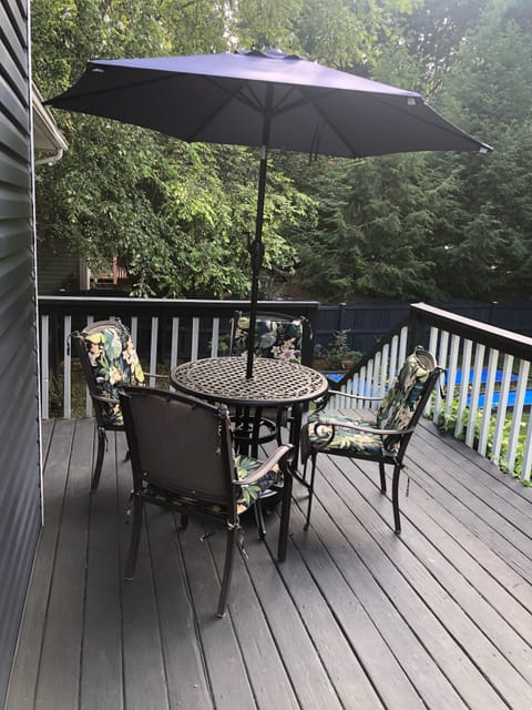 Back deck with shaded table/chairs