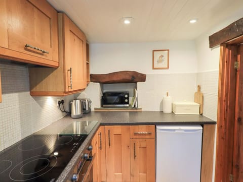 Fridge, electric kettle, toaster, cookware/dishes/utensils