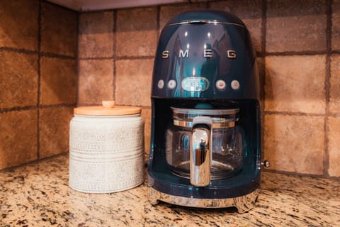 Free coffee is provided to make in the Smeg coffee machine! Tea provided as well