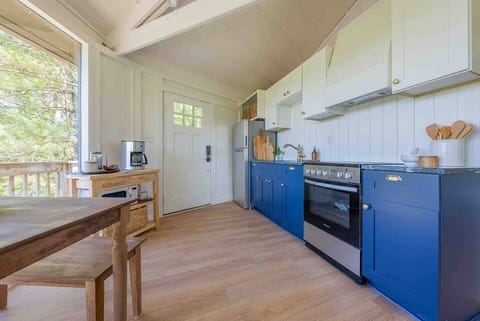 The kitchen opens up to the dining space and living room. 