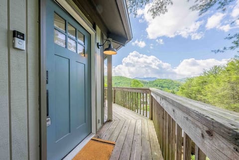 Front door with digital lock and Ring doorbell. 